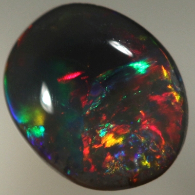SOLID BLACK OPAL Bright, rich cherry red rolling flashes